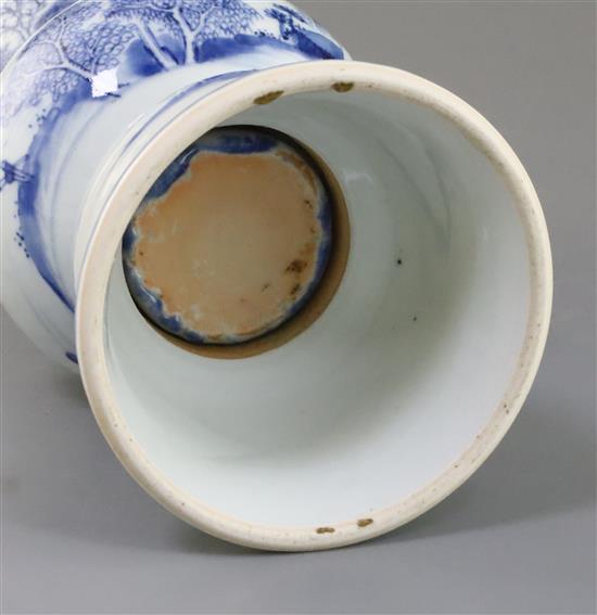 A Chinese blue and white beaker landscape vase, gu, Kangxi period, H. 30.5cm, lean to one side